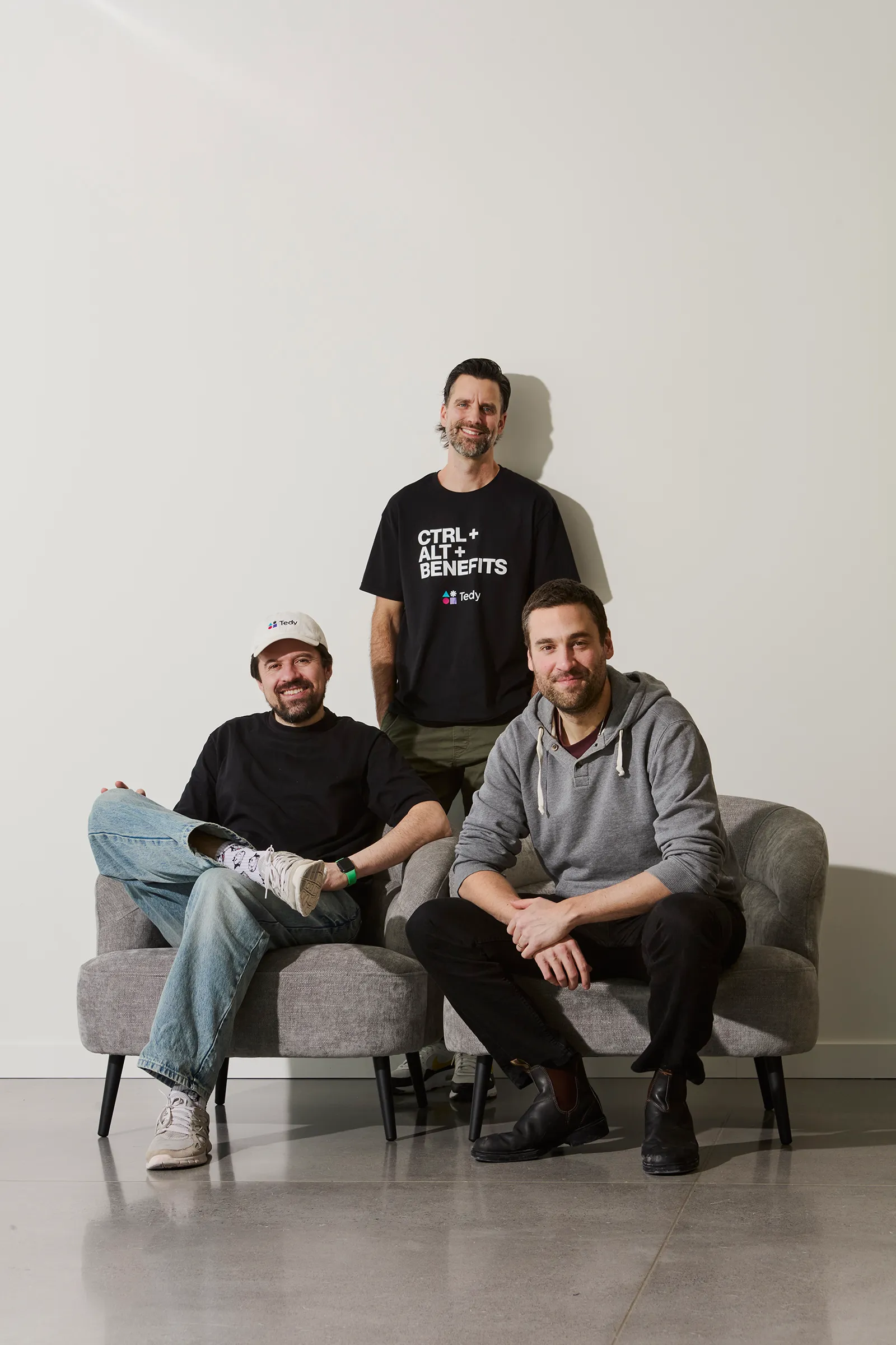 Three of Tedy's founders smiling